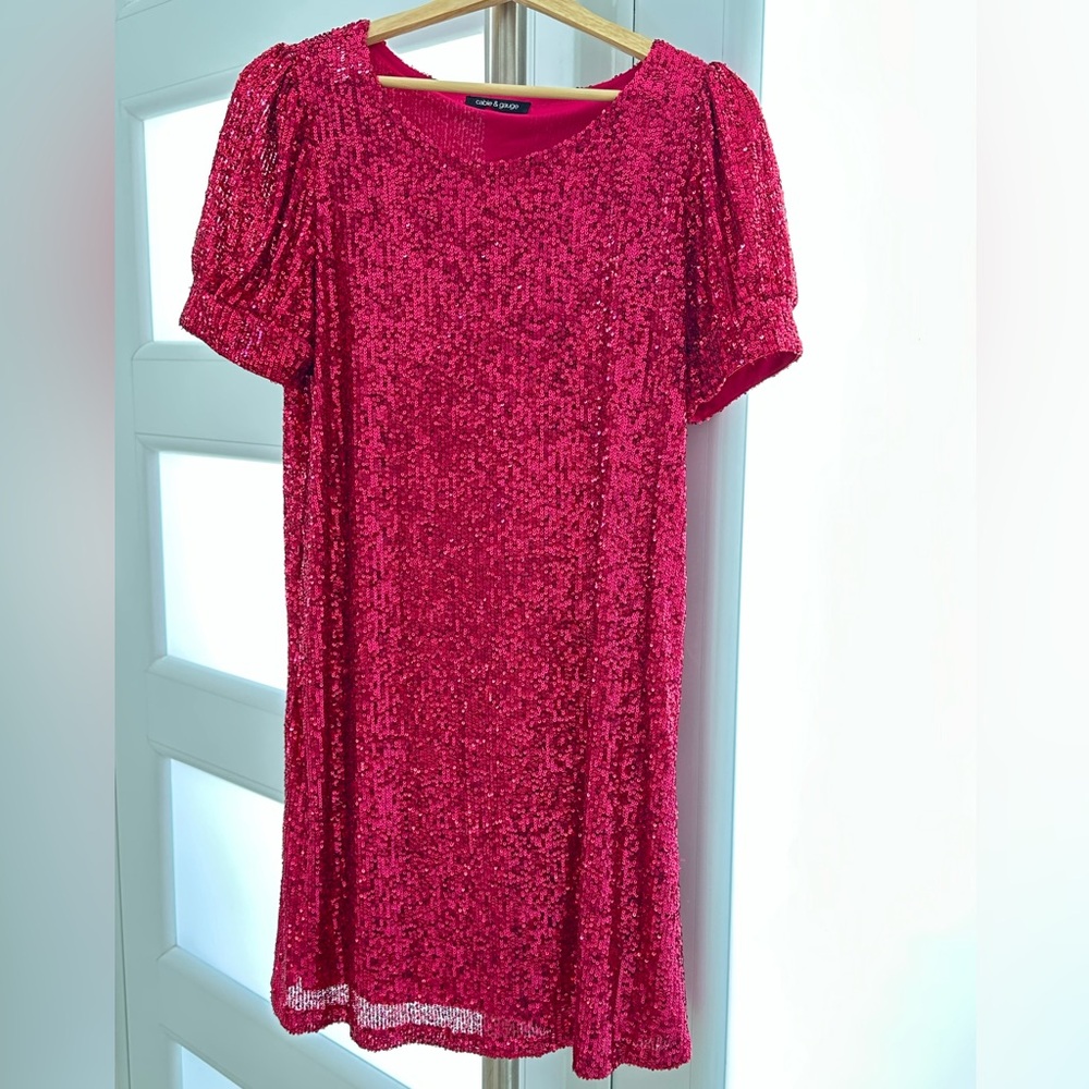 Traje con lentejuelas color Fushia